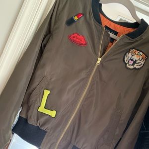 Olive green light weight bomber jacket.